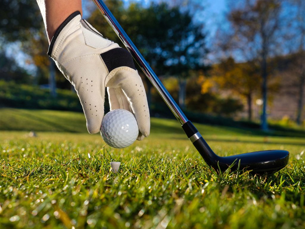 Closeup of a person playing golf